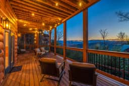 Grab a beverage and enjoy watching the sunset over the mountains