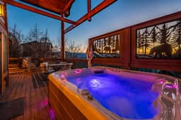 Is there anything better than soaking in your own hot tub while looking at the mountain views?