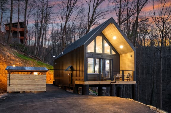 Sleek A-frame cabin with deck, hot tub pavilion & forest views